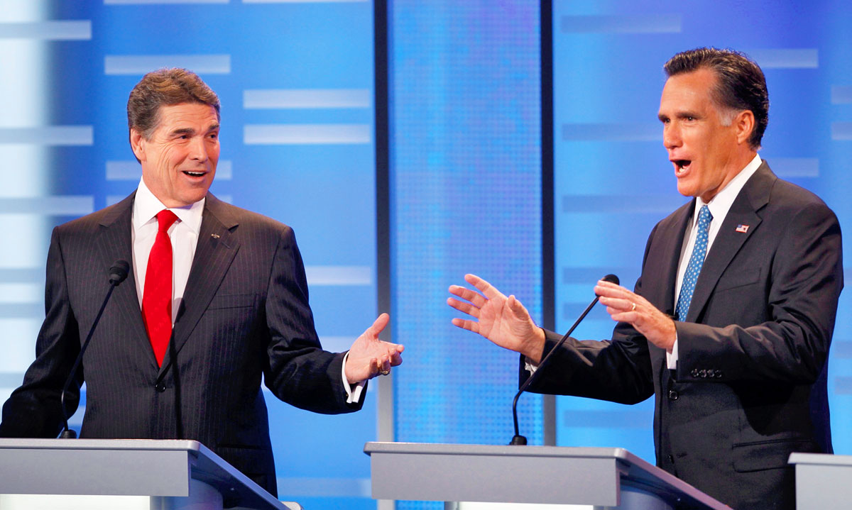 Rick Perry (balra) és Mitt Romney a iowai Drake Egyetemen tartott vita során. Sokba kerülhet még a fogadás