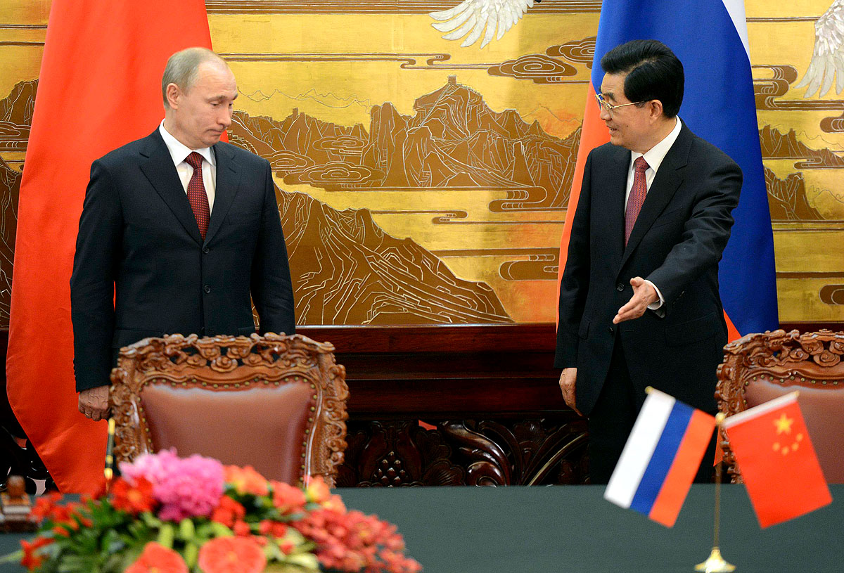 Vlagyimir Putyin (balra) és Hu Jintao (jobbra) \