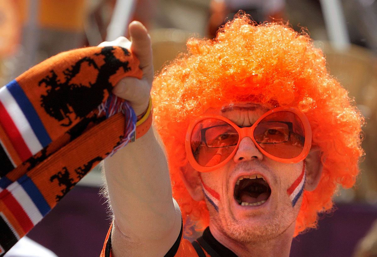 A Dutch soccer fan shouts slogans at the Euro 2012 fan zone in Kharkiv, some 480 km (300 miles) east of Kiev, June 13, 2012. The Netherlands will play against Germany their Euro 2012 match in Kharkiv on Wednesday.   REUTERS/Vasily Fedosenko (UKRAINE 