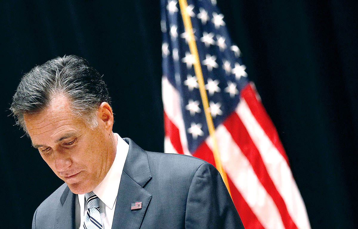 U.S. Republican presidential nominee and former Massachusetts Governor Mitt Romney pauses as speaks to reporters in Los Angeles, California, September 17, 2012.       REUTERS/Jim Young (UNITED STATES - Tags: POLITICS ELECTIONS)