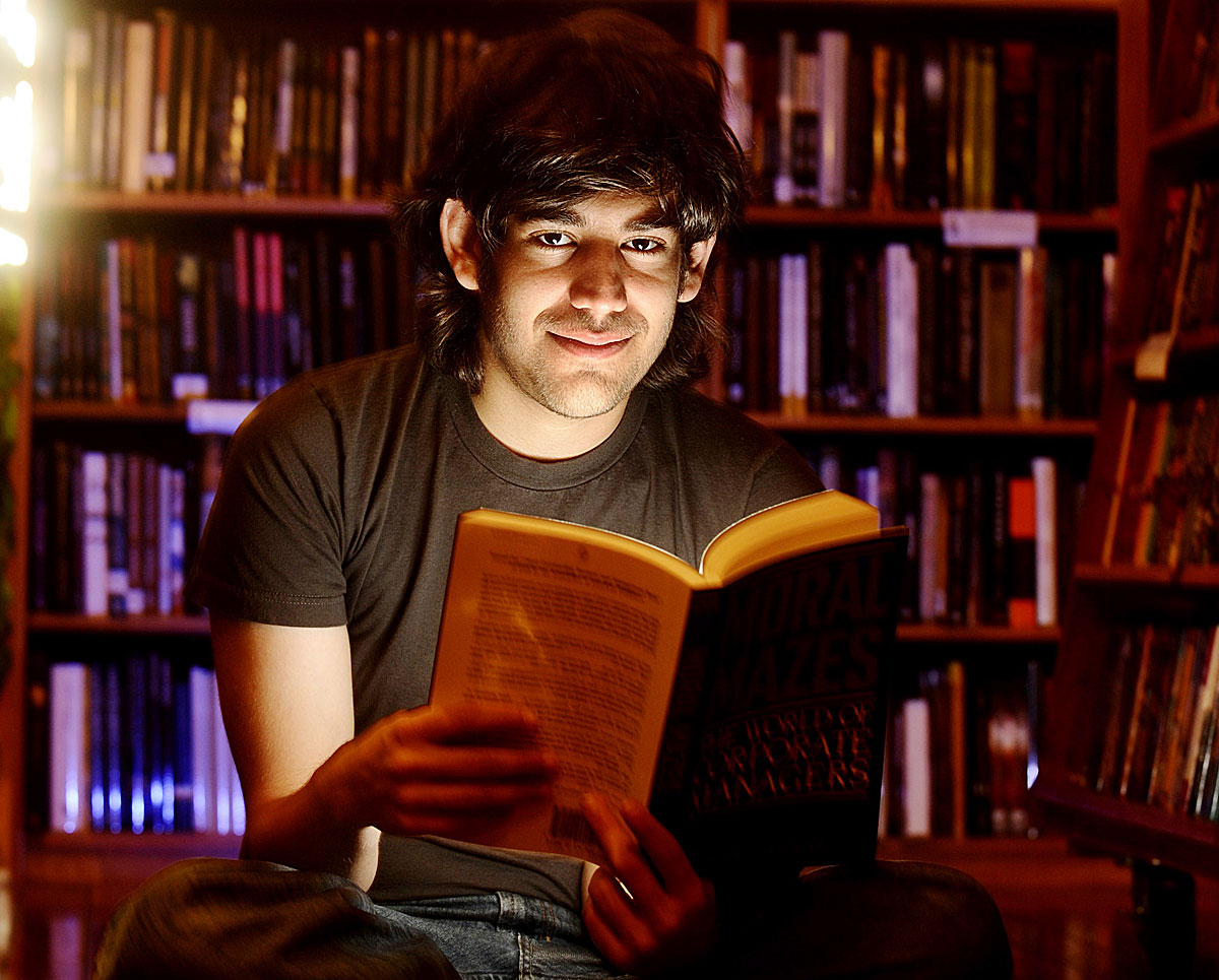 Aaron Swartz poses in a Borderland Books in San Francisco on February 4, 2008. Internet activist and programmer Swartz, who helped create an early version of RSS and later played a key role in stopping a controversial online piracy bill in Congress, 