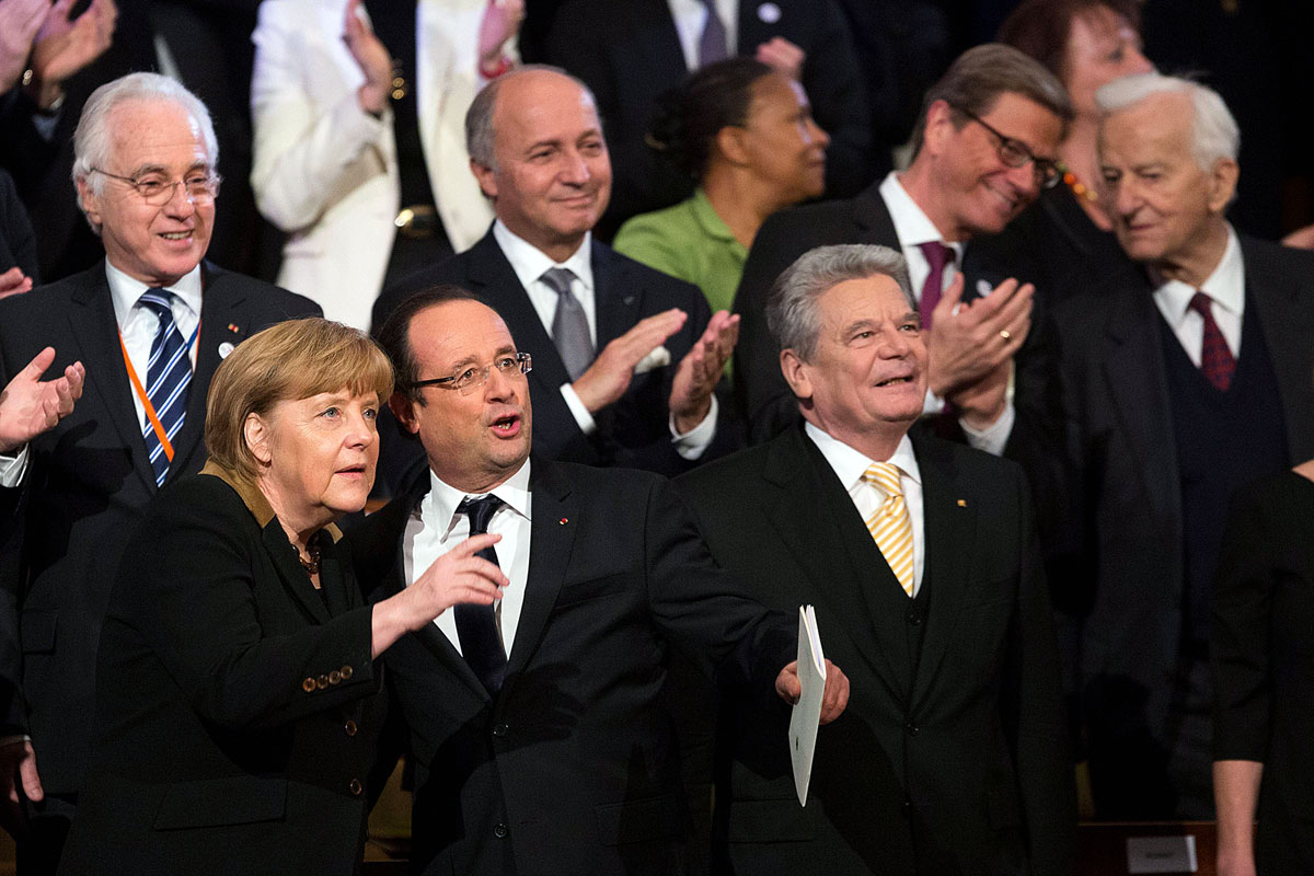 Francois Hollande és Angela Merkel a berlini filharmonikusoknál. Nem teljes az összhang