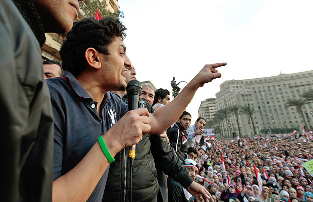 Google Inc executive Wael Ghonim addresses a mass crowd inside Tahrir Square in Cairo February 8, 2011. Ghonim, who was freed on Monday after two weeks, in which he said state security kept him blindfolded. Activists say that Ghonim was behind a Face