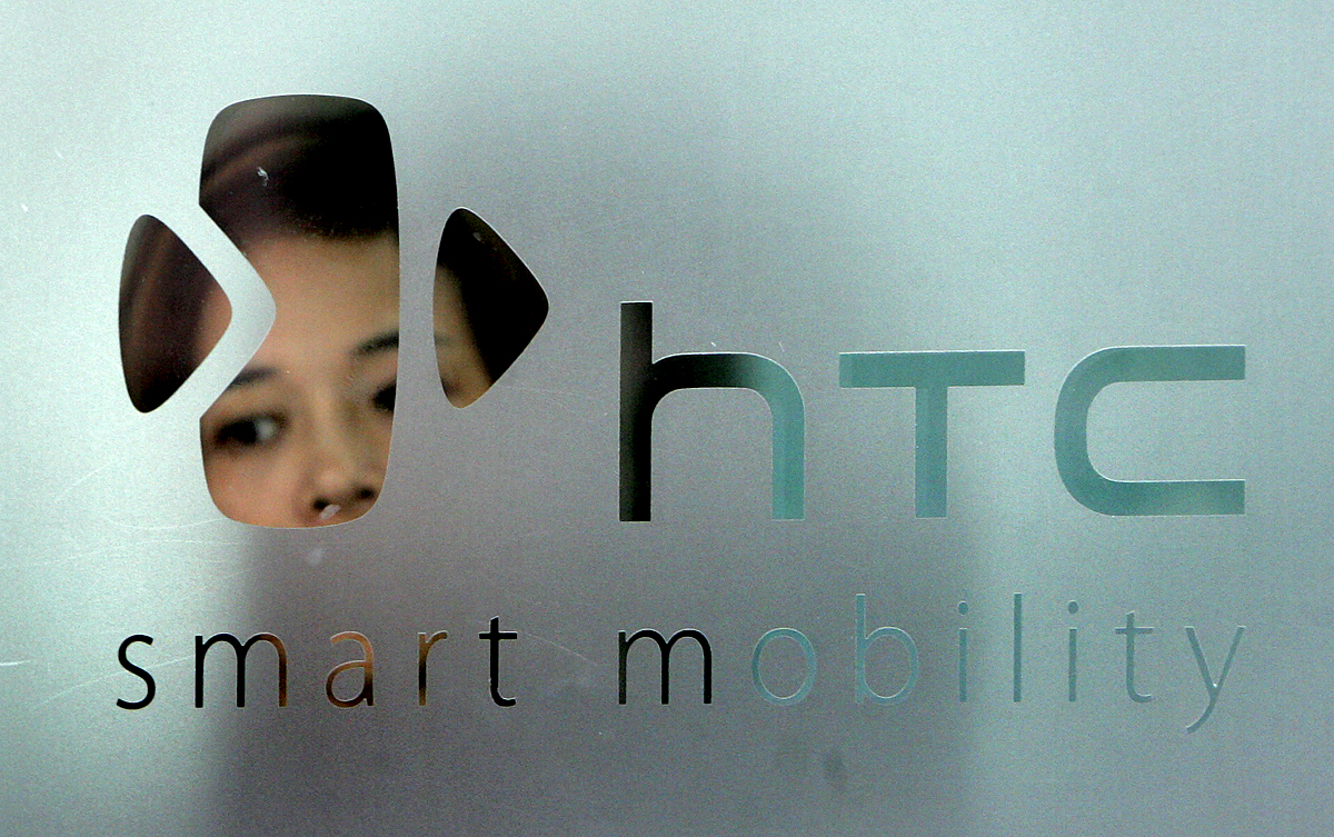 The logo of HTC is seen in Taipei September 24, 2008. The new G1 phone made by Taiwan's HTC Corp running Google's Android software was launched in New York on Tuesday. REUTERS/Pichi Chuang (TAIWAN)