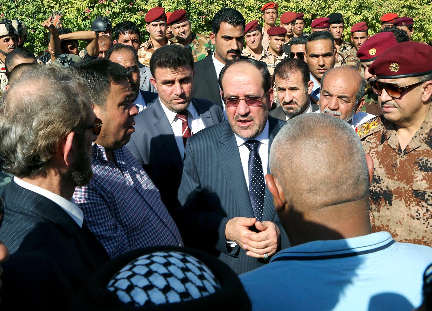 Nuri al-Maliki akár fegyveresek bevetésével is harcol a posztjáért