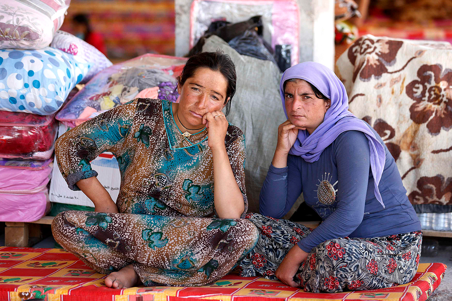 Jazidi nők Dohukban. Rengetek családot szakított szét a szunnita szélsőségesek érkezése