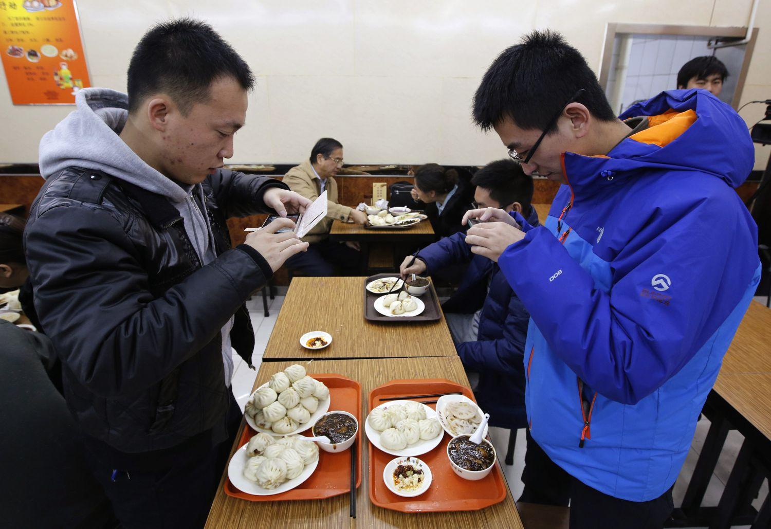 Hszi Csin-ping (Xi Jinping) kínai elnök látogatásának az utóhatása tavaly decemberben egy pekingi étteremben. A fejlesztők forgalomnövekedésre számítanak