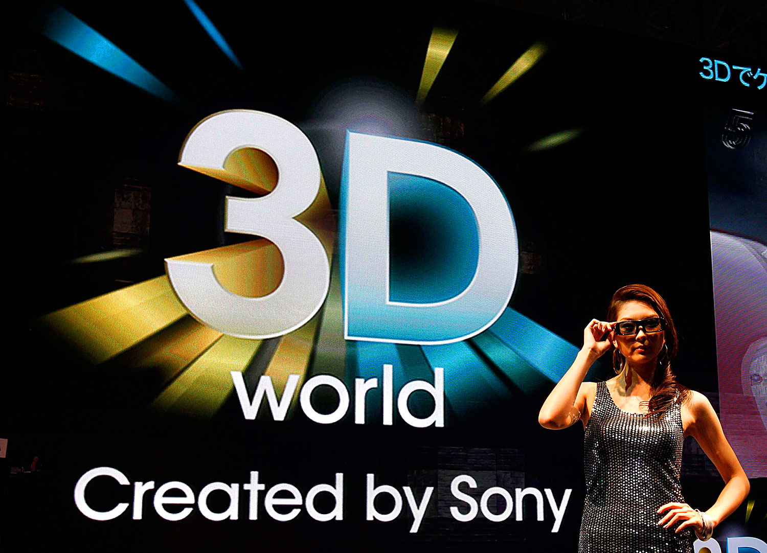 A model poses at Sony's booth to promote its 3D TV sets at CEATEC JAPAN 2010 in Chiba, east of Tokyo, October 5, 2010. The IT & Electronics exhibition showcases the latest electronic products, services and technologies and will also feature meetings 