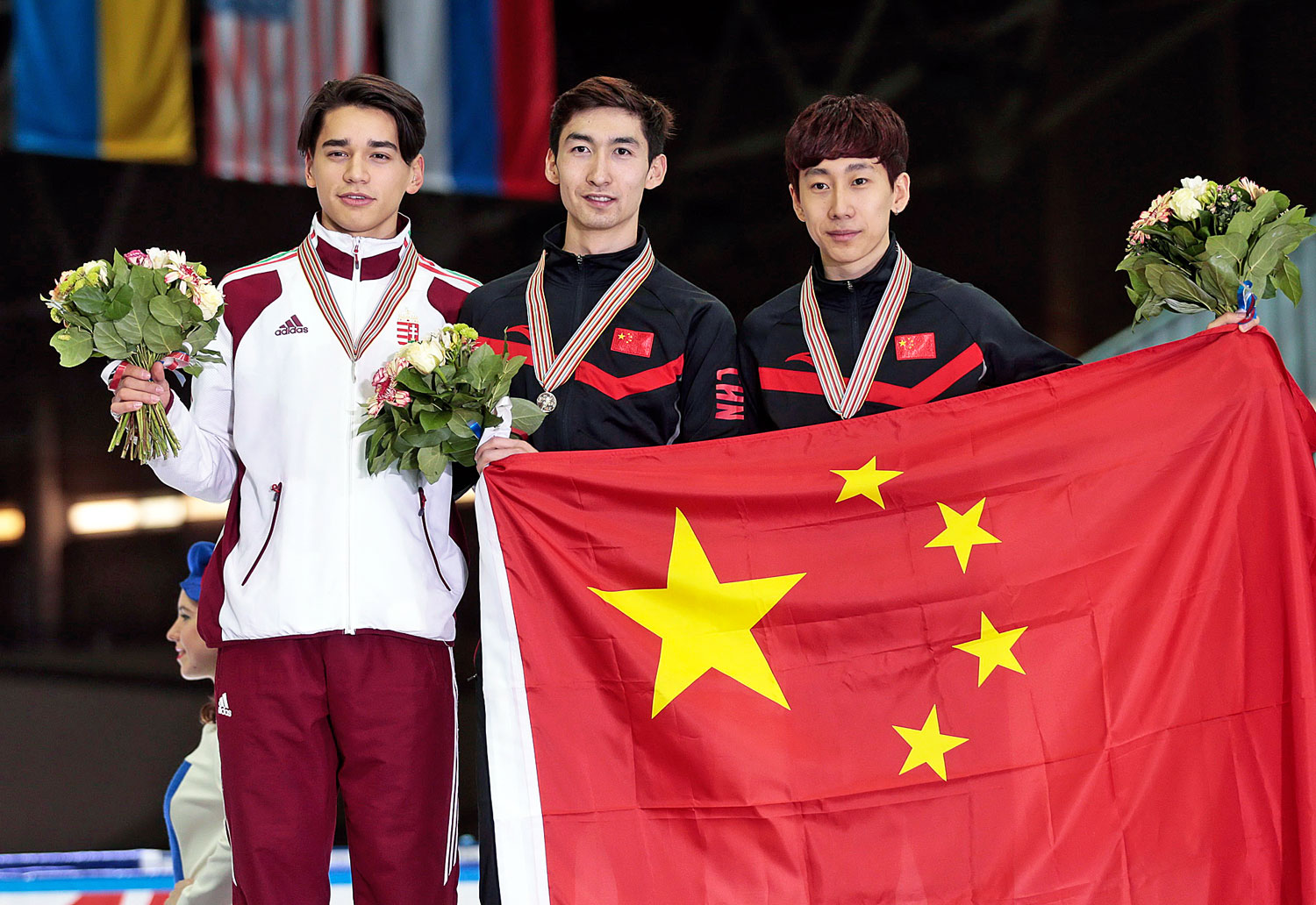 Az első és a harmadik helyezett kínai mellett az ezüstérmes Liu, a magyar fiú