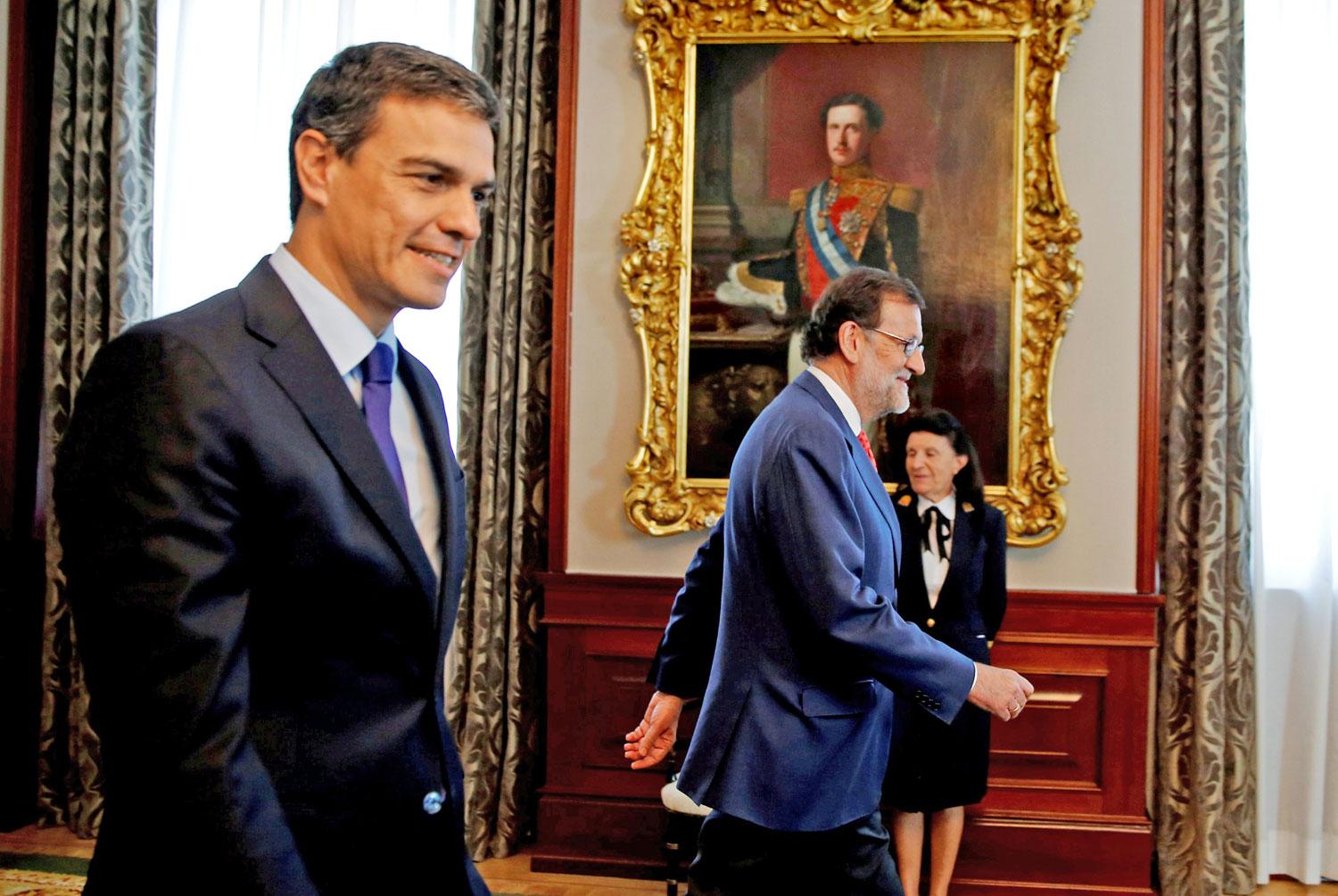 Sánchez és Rajoy. Nem egy irányba mennek 