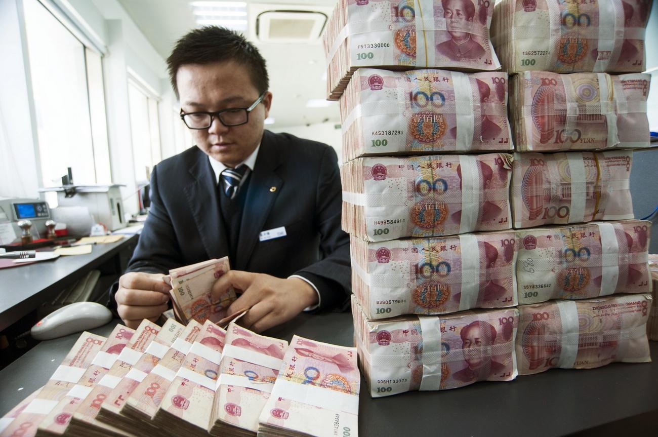 Számolás egy kínai bankban. A letelepedés pénzkérdés