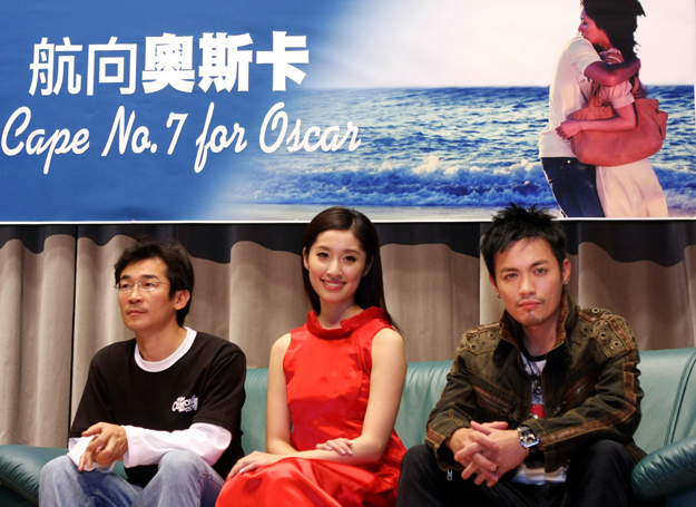 (From left) Taiwanese film director Wei Te-Sheng, Japanese actress Chie Tanaka and Taiwanese singer and actor Van Fan observe at a press conference for the movie Cape No.7 in Taipei, Taiwan, China, Tuesday, 2 December 2008.

Beijing has reversed it