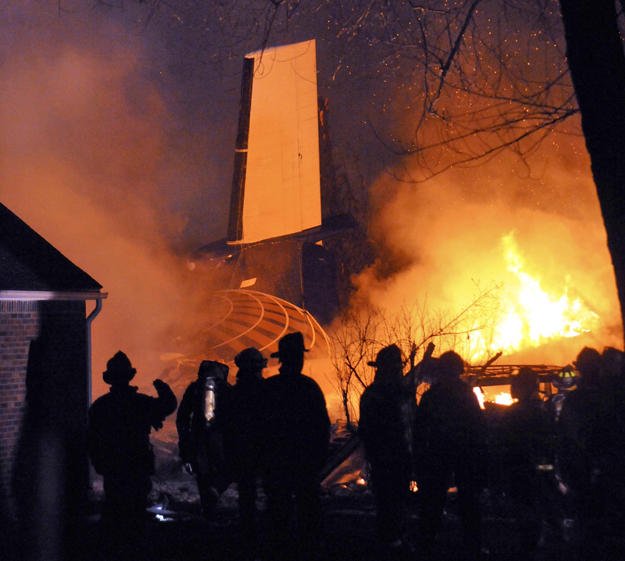 A view of the wreckage of a Continental Express flight, which crashed near Buffalo, New York February 13, 2009. A plane with 48 people on board crashed into a house near Buffalo, New York, and burst into flames late on Thursday, and MSNBC quoted the 