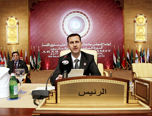 Syrian President Bashar al-Assad speaks during the opening session of the Arab summit in Doha March 30, 2009. Assad urged Arab leaders meeting in Doha on Monday to reject an international arrest warrant issued against Sudan's leader over  the Darfur 