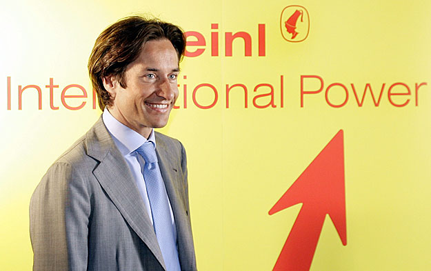 Former Austrian Finance Minister Karl-Heinz Grasser poses prior to a news conference of the newly founded company 
