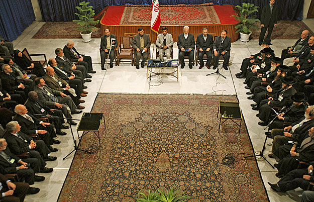 Iranian President Mahmoud Ahmadinejad attends a meeting with participants of Holocaust conference in Tehran December 12, 2006.