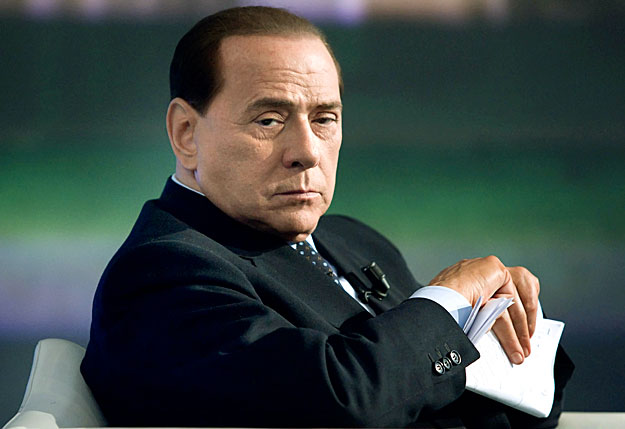 Italy's Prime Minister Silvio Berlusconi attends the taping of the television program Porta a Porta (Door to door in Italian) in Rome May 5, 2009.