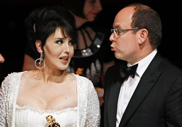 Actress Isabelle Adjani poses with Prince Albert II of Monaco after receiving the best actress award during the awards ceremony for the 49th Monte Carlo television festival in Monaco June 11, 2009.
