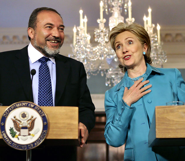 U.S. Secretary of State Hillary Clinton (R) and Israel's Foreign Minister Avigdor Lieberman (L) speak at a joint news conference following their meeting at the State Department in Washington June 17, 2009.
