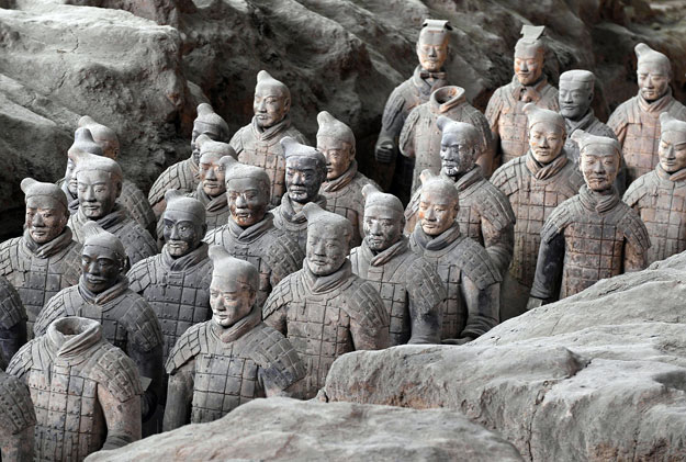 Hundreds of Terracotta warriors, which were unearthed during the first excavation from 1978 to 1984, stand inside the No.1 pit at a museum in Xi'an, Shaanxi province, June 13, 2009. Archaeologists started the third large-scale excavation of the Terra