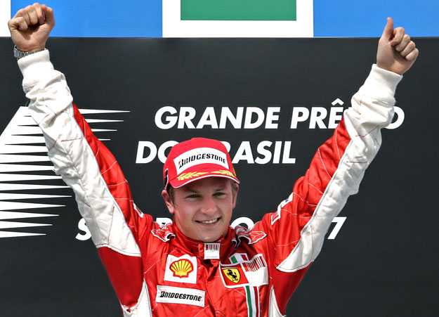 Ferrari Formula One Kimi Raikkonen of Finland celebrates on the podium after winning the Brazilian Grand Prix at the Interlagos racetrack in Sao Paulo on October 21, 2007.  Raikkonen secured his first Formula One title by a single point on Sunday aft