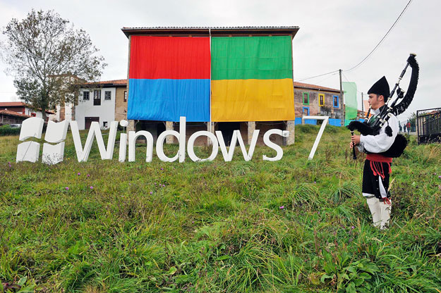 A man plays his bagpipe in front of a decorated house during the presentation of Windows 7 in the small village of Sietes, northern Spanish region of Asturias, October 22, 2009. 