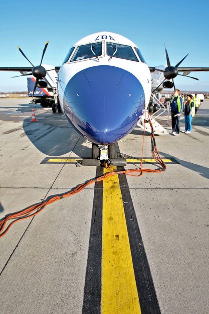 Stabil helyzetben - Malév Q400-as a ferihegyi betonon