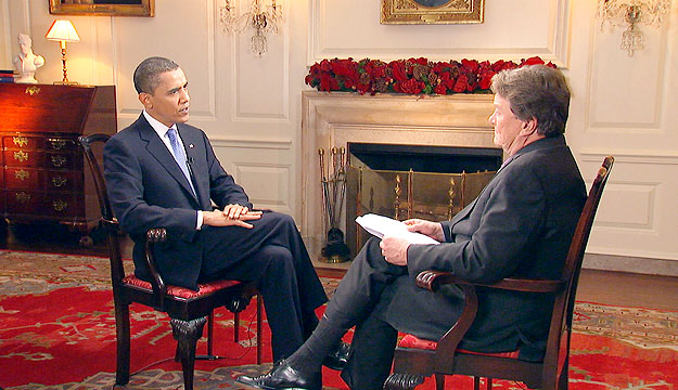 U.S. President Barack Obama talks with CBS News correspondent Steve Kroft during an interview in the Map Room of the White House, in this picture taken on December 7, 2009 and released on December 11. The interview, the president's first about his ne