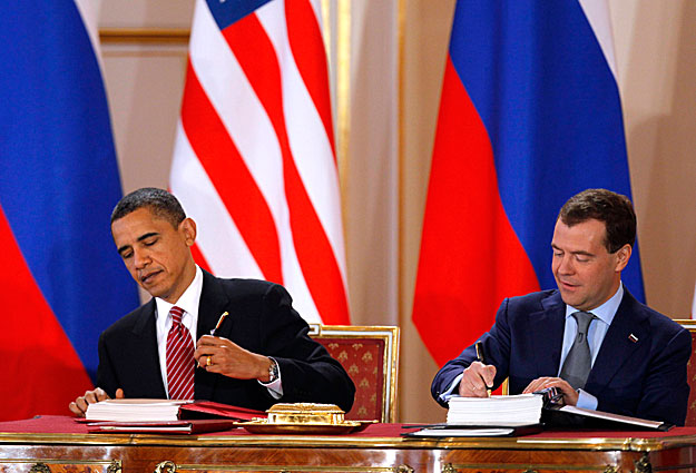 U.S. President Barack Obama and Russian President Dmitry Medvedev sign the new Strategic Arms Reduction Treaty (START II) at Prague Castle in Prague, April 8, 2010.  The United States and Russia signed a landmark disarmament treaty on Thursday they h