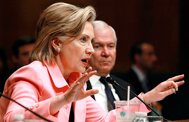 Secretary of State Hillary Clinton testifies at a Senate Foreign Relations Committee hearing on “The New START (Strategic Arms Reduction Treaty): The Policy Makers' View” on Capitol Hill in Washington May 18, 2010.  At right is Defense Secretary Robe