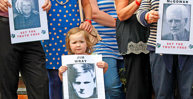 Relatives of those killed during Bloody Sunday make their way from the Bogside to the Guildhall to read the Saville report, Londonderry in Northern Ireland June 15, 2010. Prime Minister David Cameron on Tuesday unveils a landmark report into the 1972