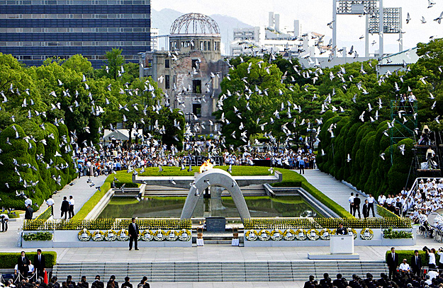 Doves fly over the Peace Memorial Park with a view of the gutted A-bomb dome at a ceremony in Hiroshima August 6, 2010, to mark the 65th anniversary of the atomic bombing on the city. The Japanese city of Hiroshima, reduced to ashes by a U.S. nuclear