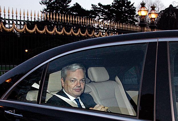 Belgian mediator Didier Reynders sits in a car as he arrives for a meeting with Belgium's King Albert II at the Laeken Royal Palace in Brussels February 16, 2011. Belgium's king asked acting Finance Minister Didier Reynders to find a way to restart s