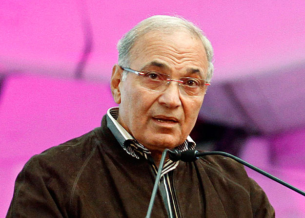 Egypt's Civil Aviation Minister Ahmed Shafiq talks during an event at the Egypt Air Maintenance and Engineering facilities in Cairo in this January 20, 2011 file photo. Egypt's military rulers have accepted the resignation of Prime Minister Ahmed Sha